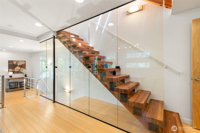 1805 N 36th St, Seattle, WA 98103 - stairs featuring wood finished floors, healthy amount of natural light, and recessed lighting