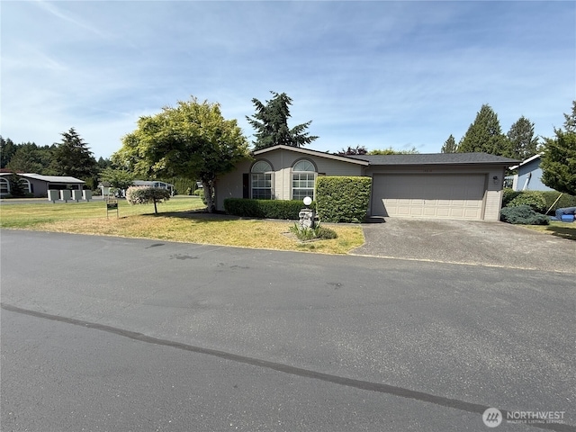14610 42nd Avenue Ct NW Unit 64, Gig Harbor, WA 98332 - view of front of property with driveway, a garage, and a front yard