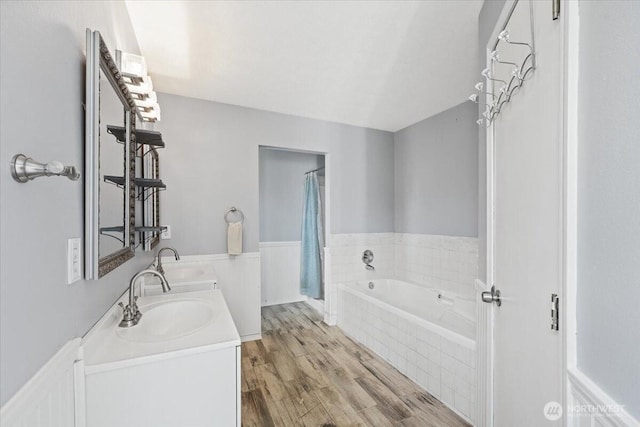 42480 N State Route 25, Davenport, WA 99122 - full bath with a bath, vanity, and wood finished floors