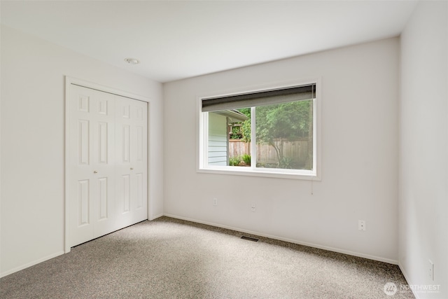 10411 23rd Street Ct E, Edgewood, WA 98372 - unfurnished bedroom with a closet and baseboards