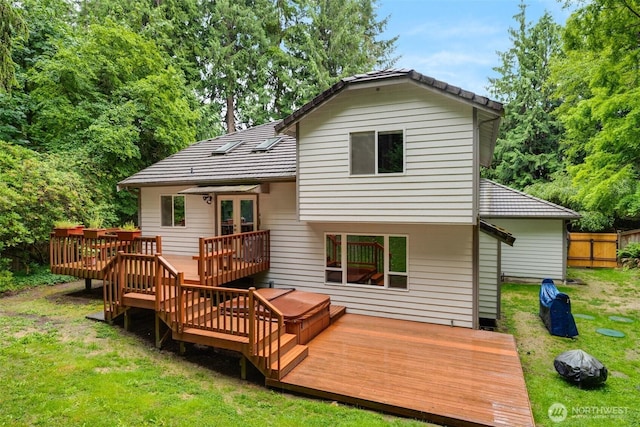 10411 23rd Street Ct E, Edgewood, WA 98372 - rear view of property with french doors and a wooden deck