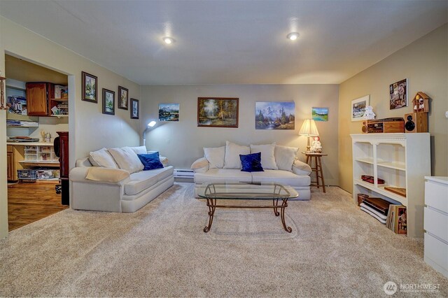 22305 Apollo Dr NE, Poulsbo, WA 98370 - carpeted living area featuring a baseboard heating unit