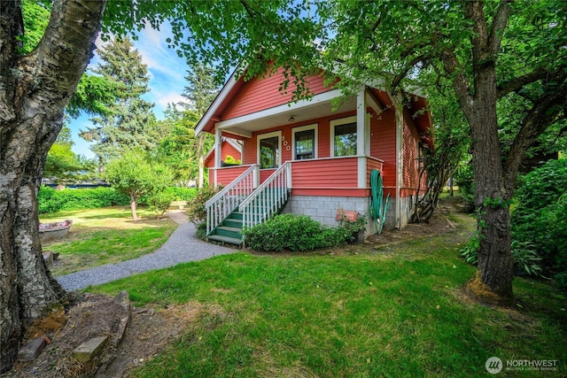 500 Wilson Ave, Bellingham, WA 98225 - view of front of house with covered porch and a front lawn