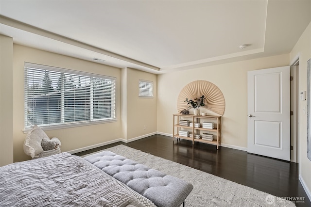 10502 SE 10th Ct Unit 9, Bellevue, WA 98004 - bedroom featuring baseboards, wood finished floors, and a raised ceiling