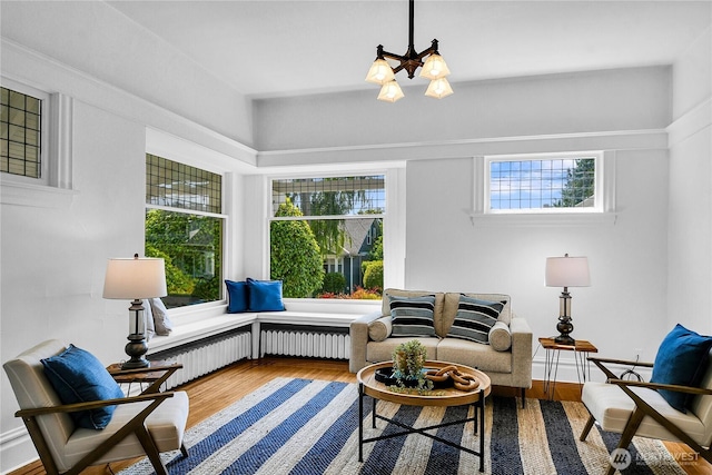 2008 Nob Hill Ave N, Seattle, WA 98119 - sitting room featuring a chandelier and wood finished floors