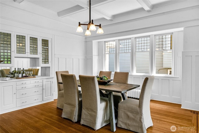 2008 Nob Hill Ave N, Seattle, WA 98119 - dining space with a decorative wall, beamed ceiling, coffered ceiling, dark wood-style flooring, and a chandelier