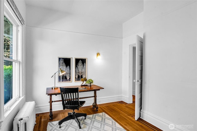 2008 Nob Hill Ave N, Seattle, WA 98119 - office space featuring radiator heating unit, wood finished floors, and baseboards