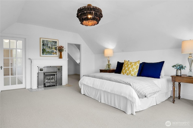 2008 Nob Hill Ave N, Seattle, WA 98119 - bedroom with vaulted ceiling, carpet flooring, a fireplace, and baseboards