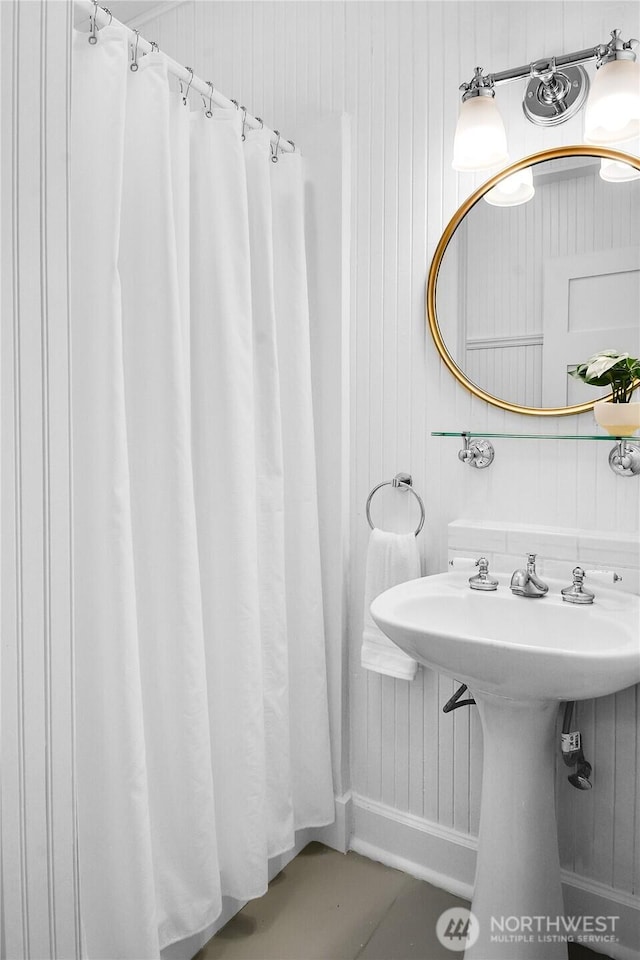2008 Nob Hill Ave N, Seattle, WA 98119 - bathroom featuring curtained shower and a sink