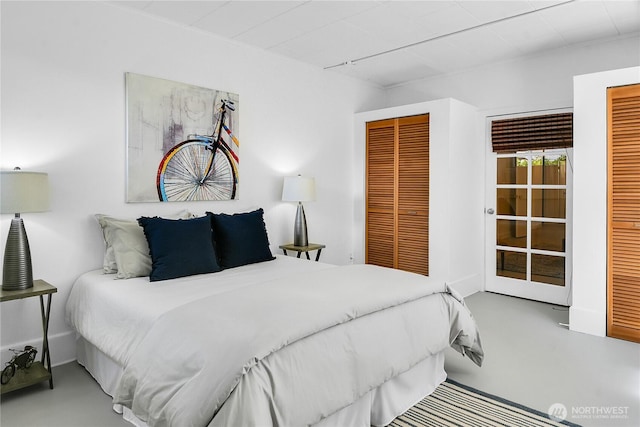 2008 Nob Hill Ave N, Seattle, WA 98119 - bedroom with two closets and concrete floors