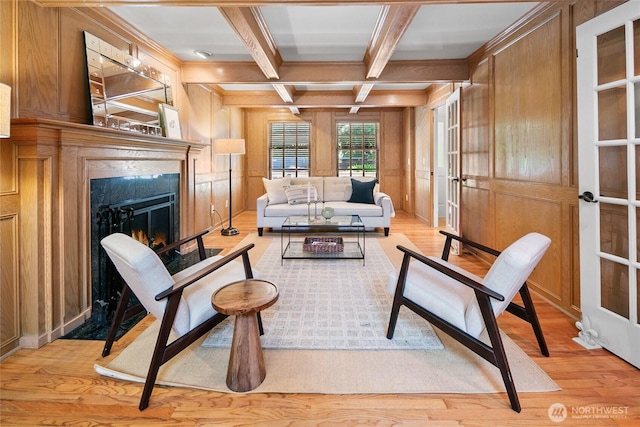 2020 Evergreen Point Rd, Medina, WA 98039 - living room featuring light wood finished floors, beam ceiling, coffered ceiling, a lit fireplace, and crown molding