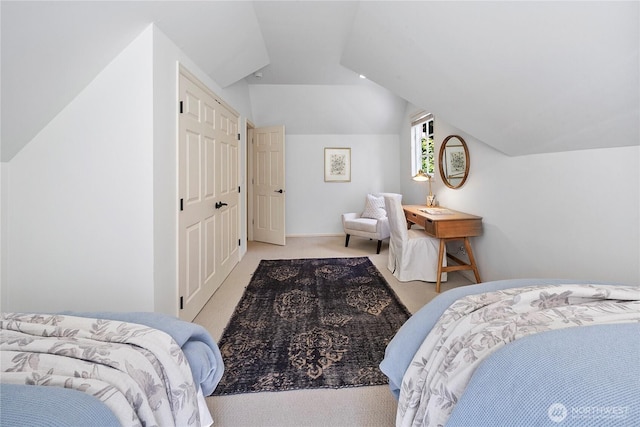 2020 Evergreen Point Rd, Medina, WA 98039 - bedroom with light carpet, lofted ceiling, and baseboards