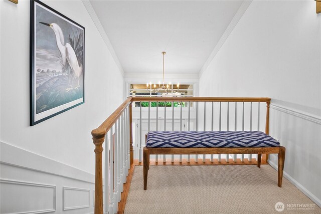 2020 Evergreen Point Rd, Medina, WA 98039 - stairs featuring ornamental molding, carpet, a chandelier, and wainscoting