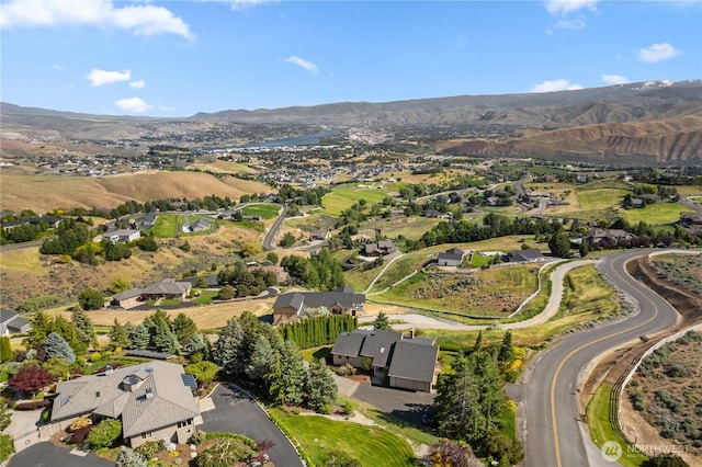 4261 April Dr, Wenatchee, WA 98801 - aerial view of property and surrounding area with a mountainous background and nearby suburban area