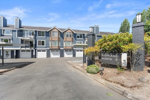 150 NE 95th St Unit 205, Seattle, WA 98115 - view of road with curbs and a residential view