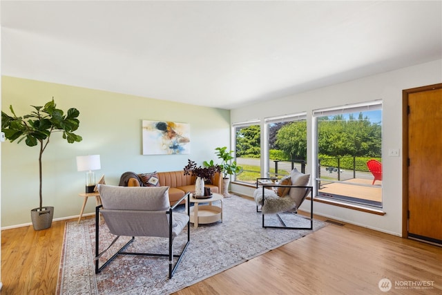 3309 W 2nd St, Anacortes, WA 98221 - living room featuring wood finished floors and baseboards