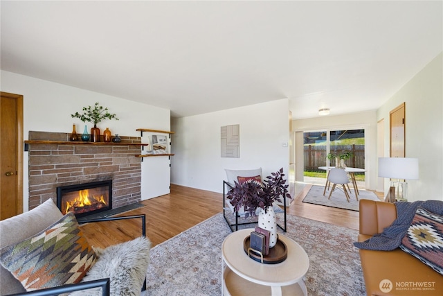 3309 W 2nd St, Anacortes, WA 98221 - living room with wood finished floors and a fireplace