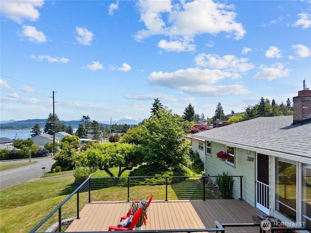 3309 W 2nd St, Anacortes, WA 98221 - wooden deck featuring a lawn