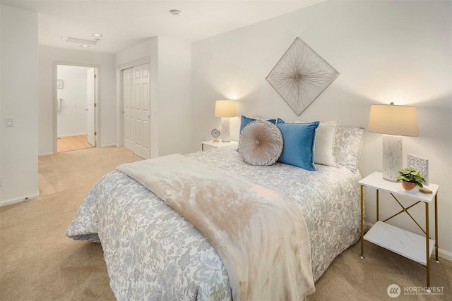 3673 224th Pl SE Unit 1349, Issaquah, WA 98029 - bedroom with carpet, baseboards, and a closet