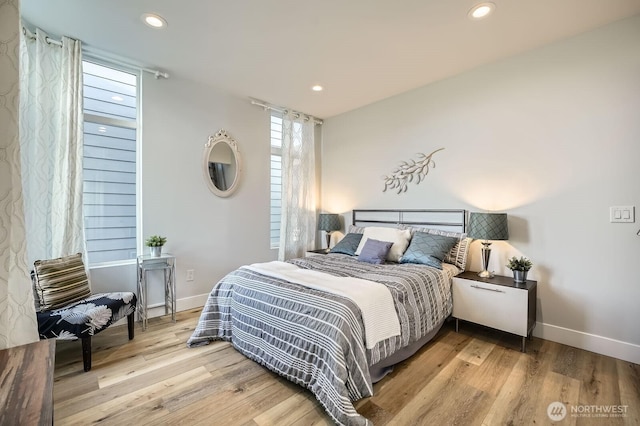 1808 S Raymond St, Seattle, WA 98108 - bedroom with baseboards, wood finished floors, and recessed lighting
