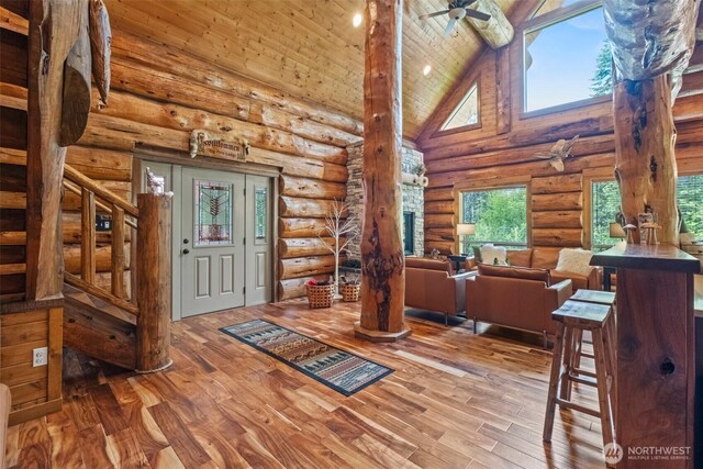 158 Big Pine Dr, Leavenworth, WA 98826 - foyer featuring rustic walls, high vaulted ceiling, stairway, wood finished floors, and wood ceiling