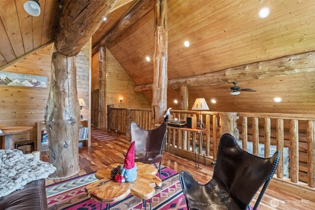 158 Big Pine Dr, Leavenworth, WA 98826 - sitting room with wood ceiling, wooden walls, wood finished floors, ceiling fan, and an upstairs landing