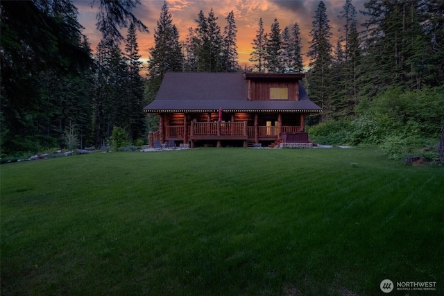 158 Big Pine Dr, Leavenworth, WA 98826 - view of front of home with a yard, log exterior, and a wooden deck