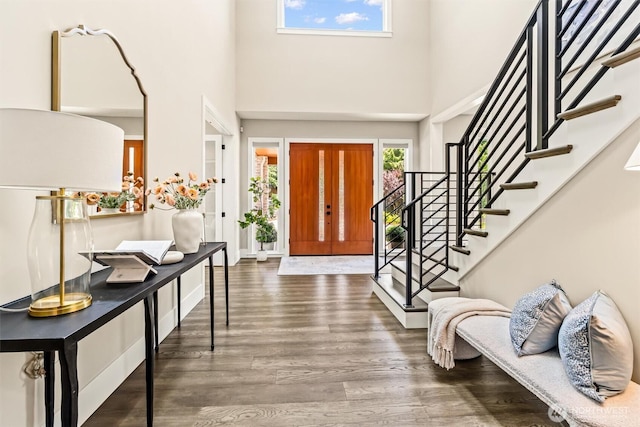 23036 35th Ave SE, Bothell, WA 98021 - foyer with a high ceiling, stairs, wood finished floors, and baseboards