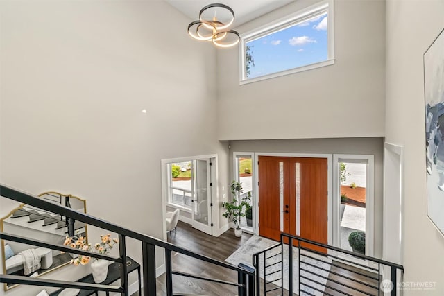 23036 35th Ave SE, Bothell, WA 98021 - entrance foyer with a chandelier, a high ceiling, wood finished floors, and baseboards