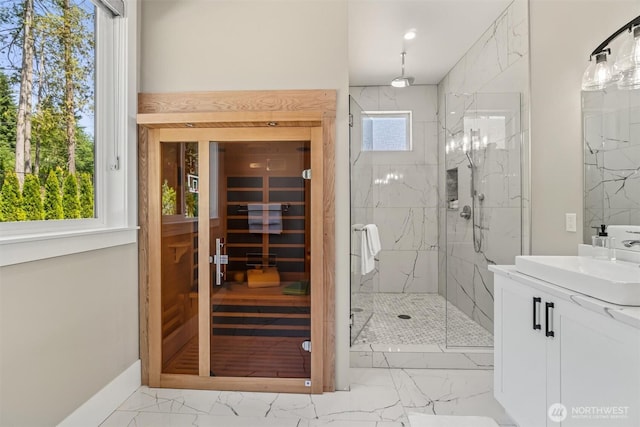 23036 35th Ave SE, Bothell, WA 98021 - full bath featuring marble finish flooring, vanity, a marble finish shower, a sauna, and baseboards