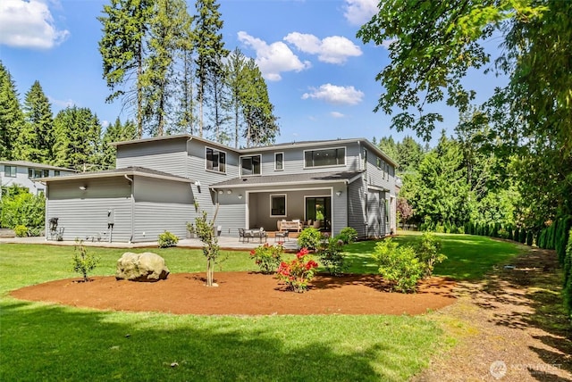23036 35th Ave SE, Bothell, WA 98021 - back of house featuring a lawn and a patio area