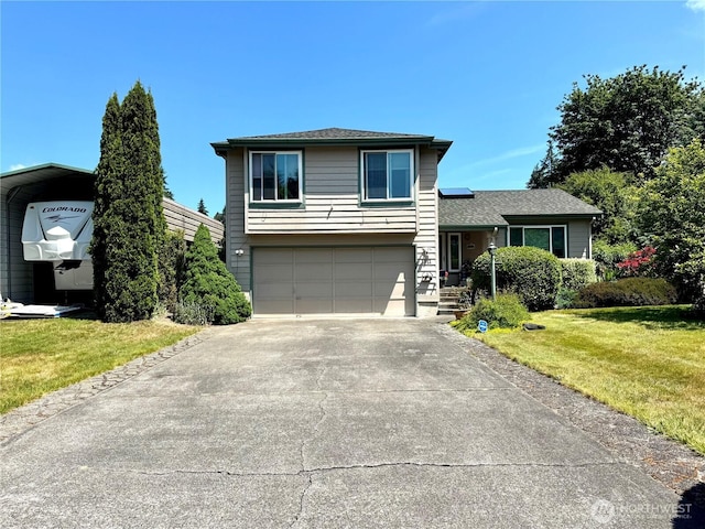 1711 Mount Rainier Blvd, Spanaway, WA 98387 - tri-level home featuring a front lawn, asphalt driveway, an attached garage, and solar panels