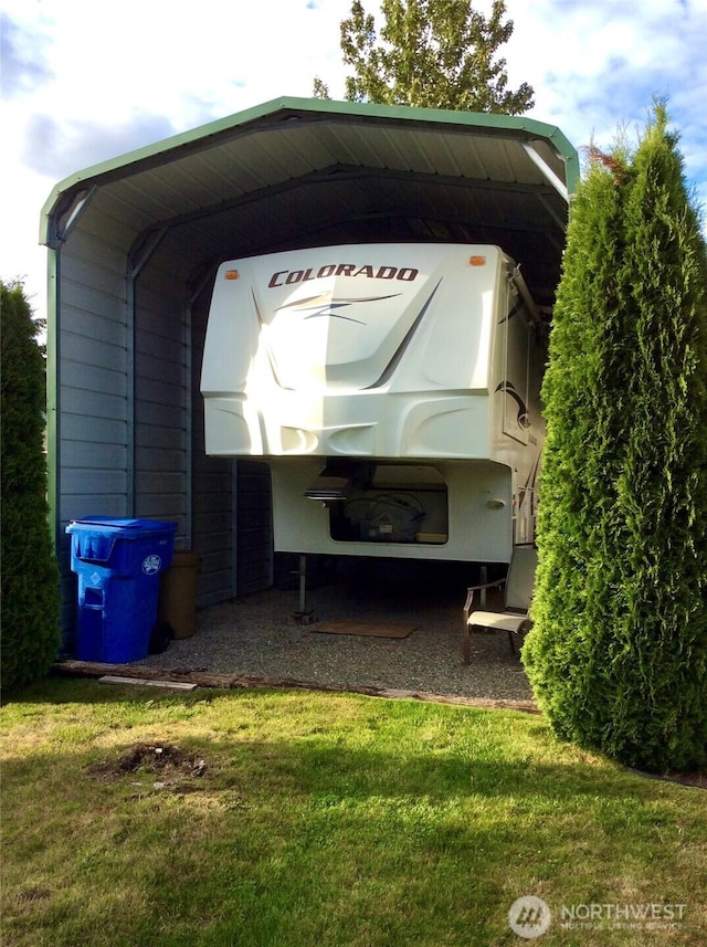 1711 Mount Rainier Blvd, Spanaway, WA 98387 - view of car parking featuring a detached carport