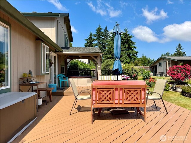 1711 Mount Rainier Blvd, Spanaway, WA 98387 - wooden deck with a jacuzzi
