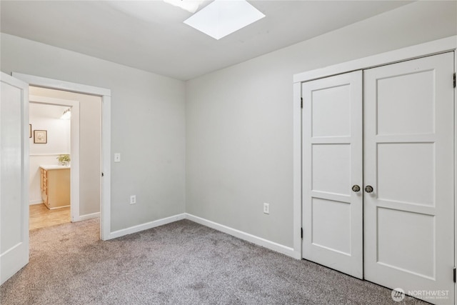 13257 4th Ave S, Burien, WA 98168 - unfurnished bedroom with a skylight, carpet, baseboards, and a closet