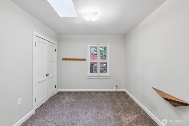 13257 4th Ave S, Burien, WA 98168 - carpeted empty room featuring baseboards and a skylight