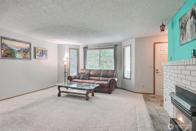 152 S 324th Pl Unit 65, Federal Way, WA 98003 - living area featuring baseboards, light carpet, a textured ceiling, and a fireplace