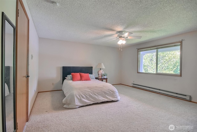 152 S 324th Pl Unit 65, Federal Way, WA 98003 - carpeted bedroom featuring a baseboard radiator, a textured ceiling, ceiling fan, and baseboards