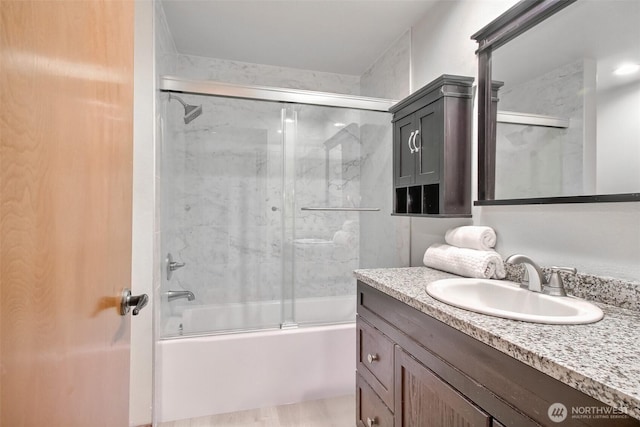 152 S 324th Pl Unit 65, Federal Way, WA 98003 - bathroom featuring vanity and combined bath / shower with glass door