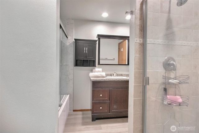 152 S 324th Pl Unit 65, Federal Way, WA 98003 - bathroom featuring vanity and wood finished floors