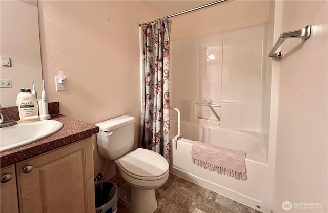 30211 O Pl, Ocean Park, WA 98640 - full bathroom with vanity, toilet, shower / tub combo with curtain, and stone finish floors