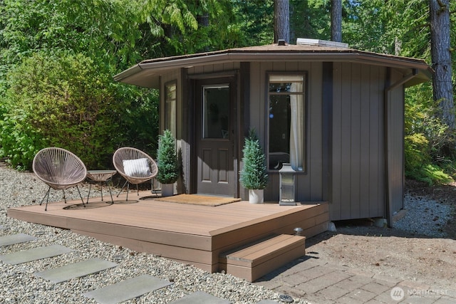 6570 E Grapeview Loop Rd, Allyn, WA 98524 - wooden terrace featuring an outdoor structure