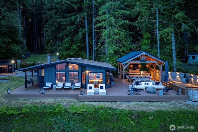6570 E Grapeview Loop Rd, Allyn, WA 98524 - view of patio / terrace featuring an outdoor living space, a deck, and an outdoor structure