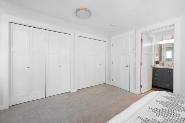 4121 Martin Luther King Jr Way S, Seattle, WA 98108 - unfurnished bedroom featuring two closets, carpet flooring, and connected bathroom