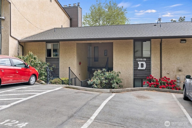 12515 NE 145th Pl Unit D121, Kirkland, WA 98034 - view of property with uncovered parking