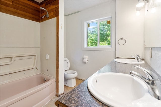 1627 SE Holman Rd, Port Orchard, WA 98367 - bathroom featuring toilet, bathing tub / shower combination, double vanity, and tile patterned flooring