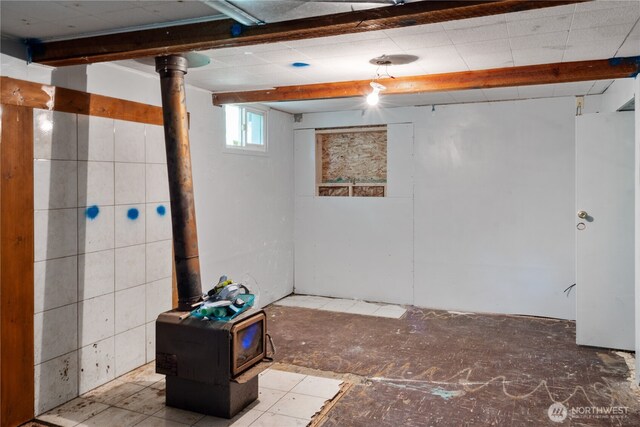 1627 SE Holman Rd, Port Orchard, WA 98367 - below grade area featuring a wood stove