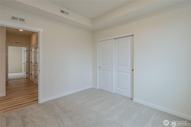 603 Cardinal Ave, Winlock, WA 98596 - unfurnished bedroom with baseboards, carpet, and a closet