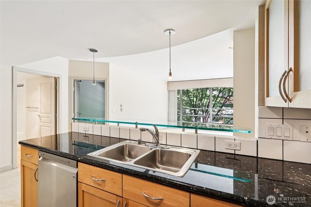 2929 1st Ave Unit 205, Seattle, WA 98121 - kitchen with dishwasher, decorative light fixtures, and dark stone counters