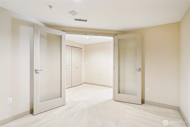 2929 1st Ave Unit 205, Seattle, WA 98121 - unfurnished bedroom with carpet and a closet